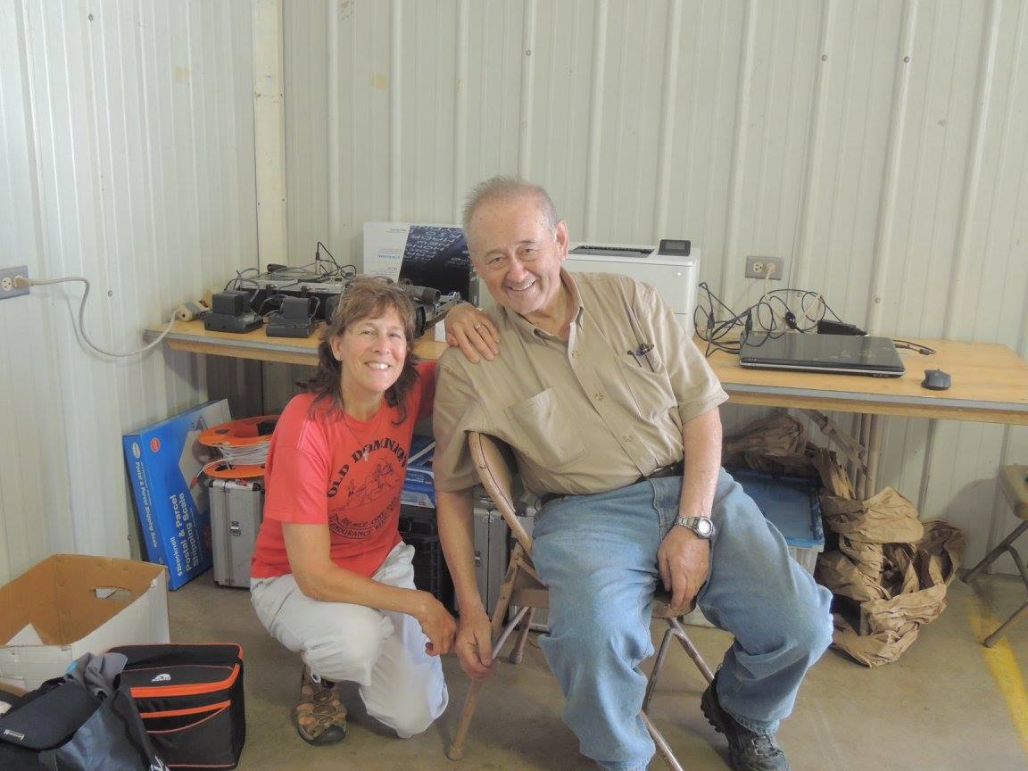 Kelly C, head medical chief, and Henry M, head timer, smile at camera