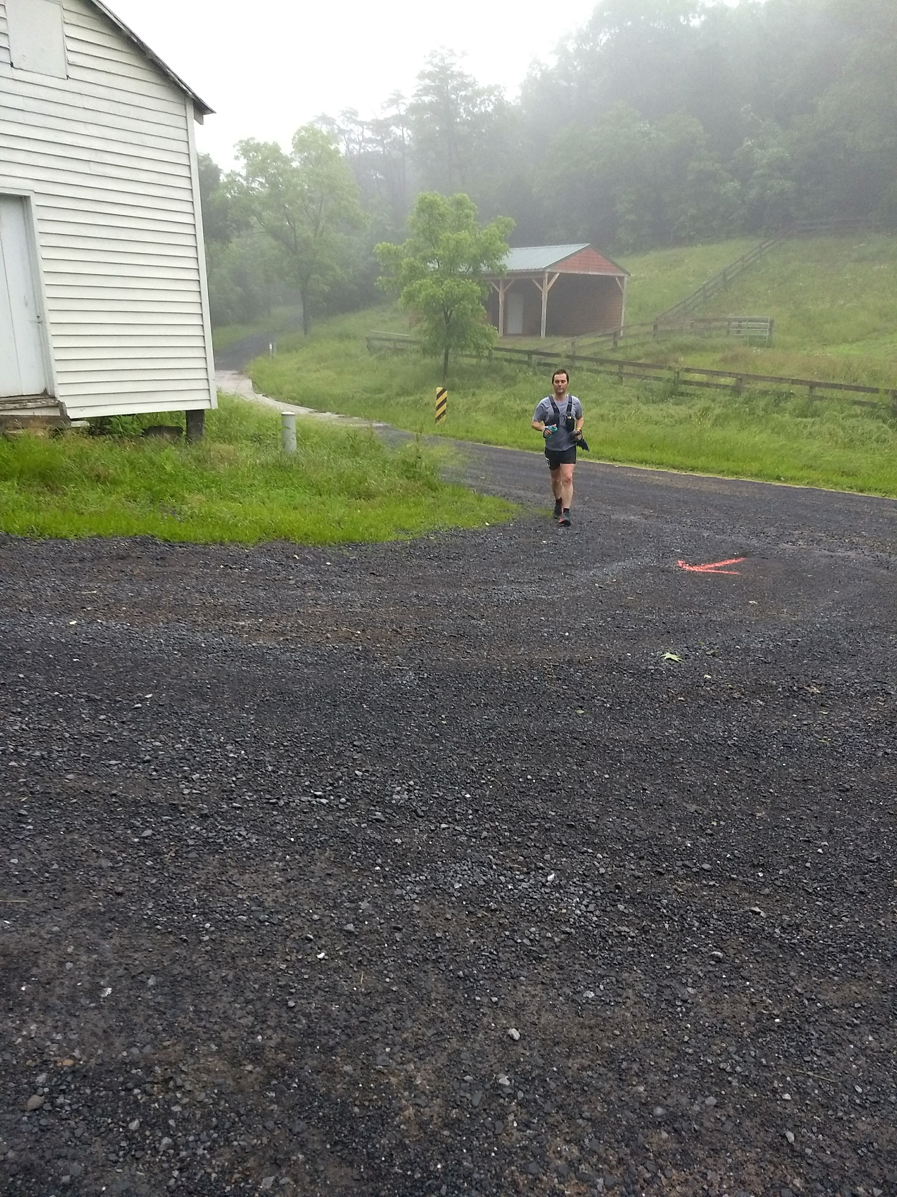 Runner, turns the bend in the early hour of the event.