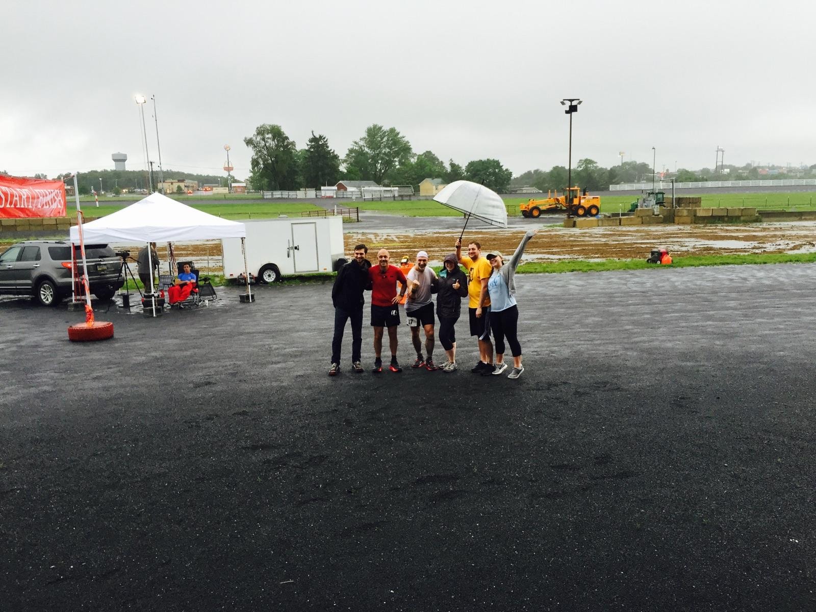 Sunday Morning Group photo in the rain. Tim Weber and Mark with their crew.