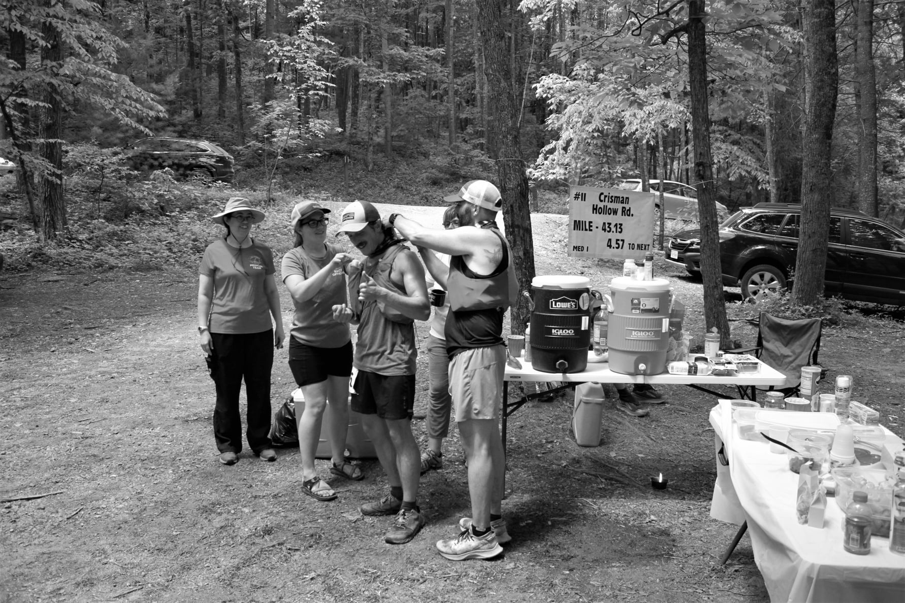 Wesley Claytor receives ice in his neck gaitor at Crisman Hollow Aid.