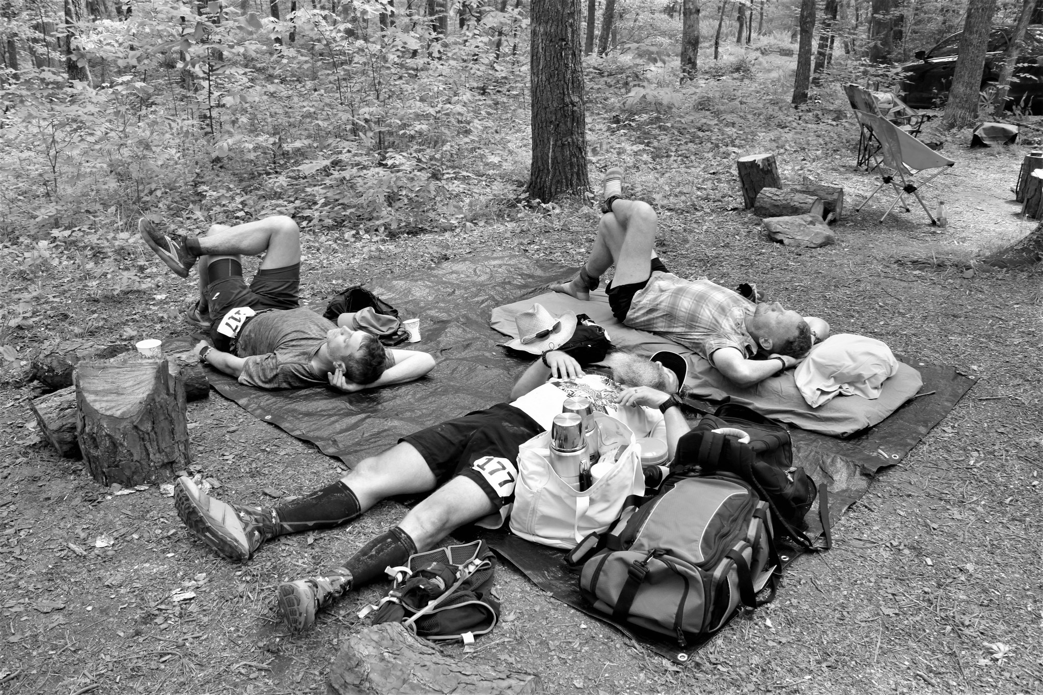 3 guys lay down recovering